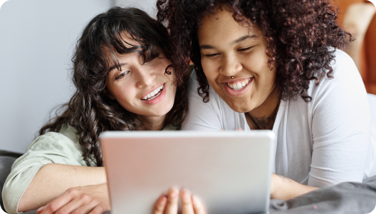 Give us feedback A couple is giving feedback on a laptop